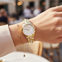 Michael Kors Runway MK6689 Women’s Gold Mother-of-Pearl Dial Pyramid-Link Bracelet Watch
