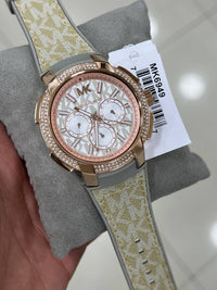 Michael Kors Sidney MK6949 Rose Gold-Tone Crystal Grey Logo Rubber Women's Watch